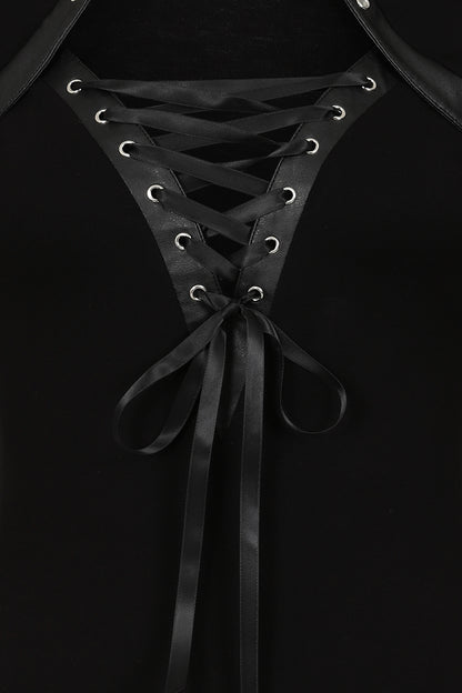 Close-up of black laced garment on a black background