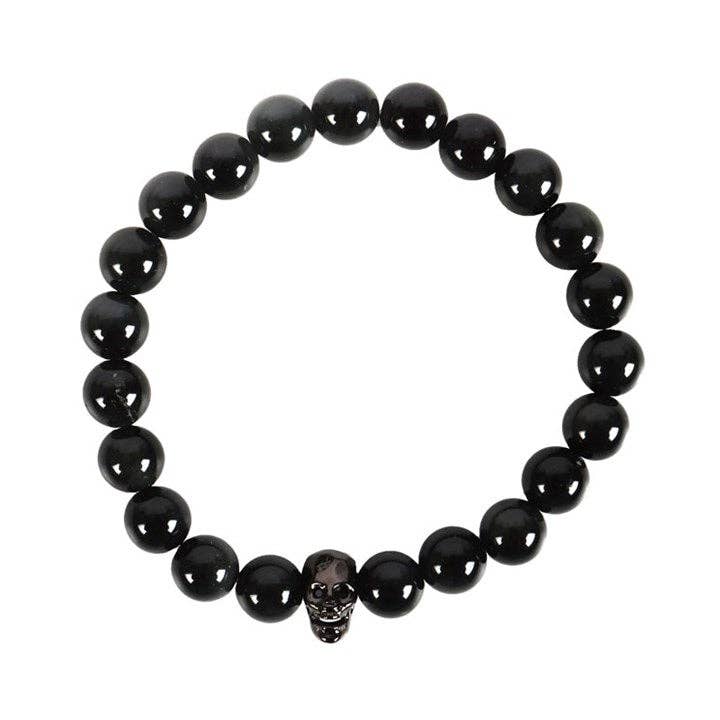 Black beaded bracelet with a skull charm on a white background