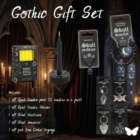 Gothic gift set with spell candles, skull necklace, bracelet, and keyrings in a dark, cathedral-like setting.