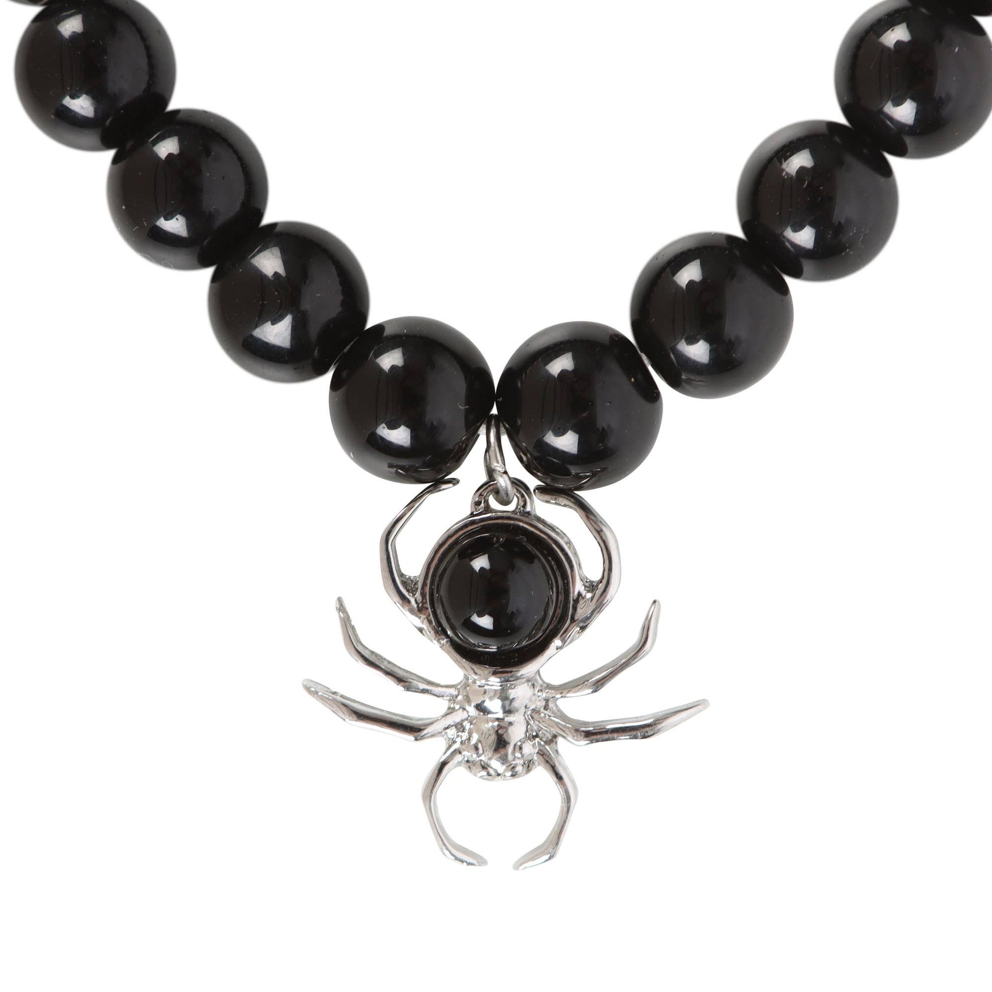 Black beaded bracelet with a silver spider charm on a white background