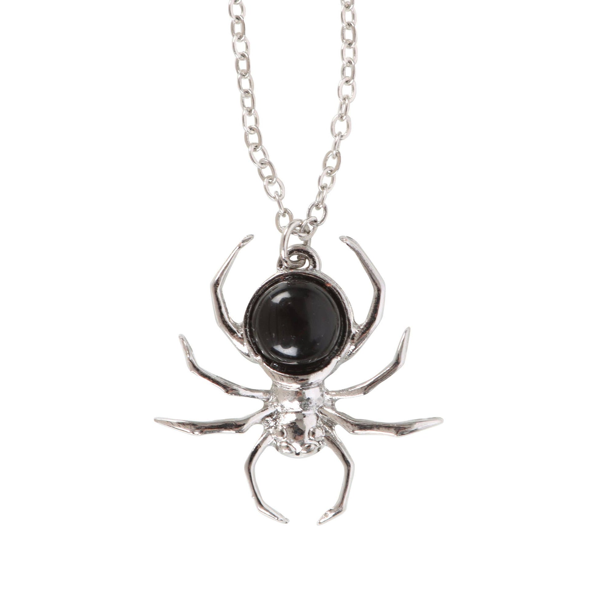 Spider-shaped pendant with a black gemstone on a silver chain against a white background