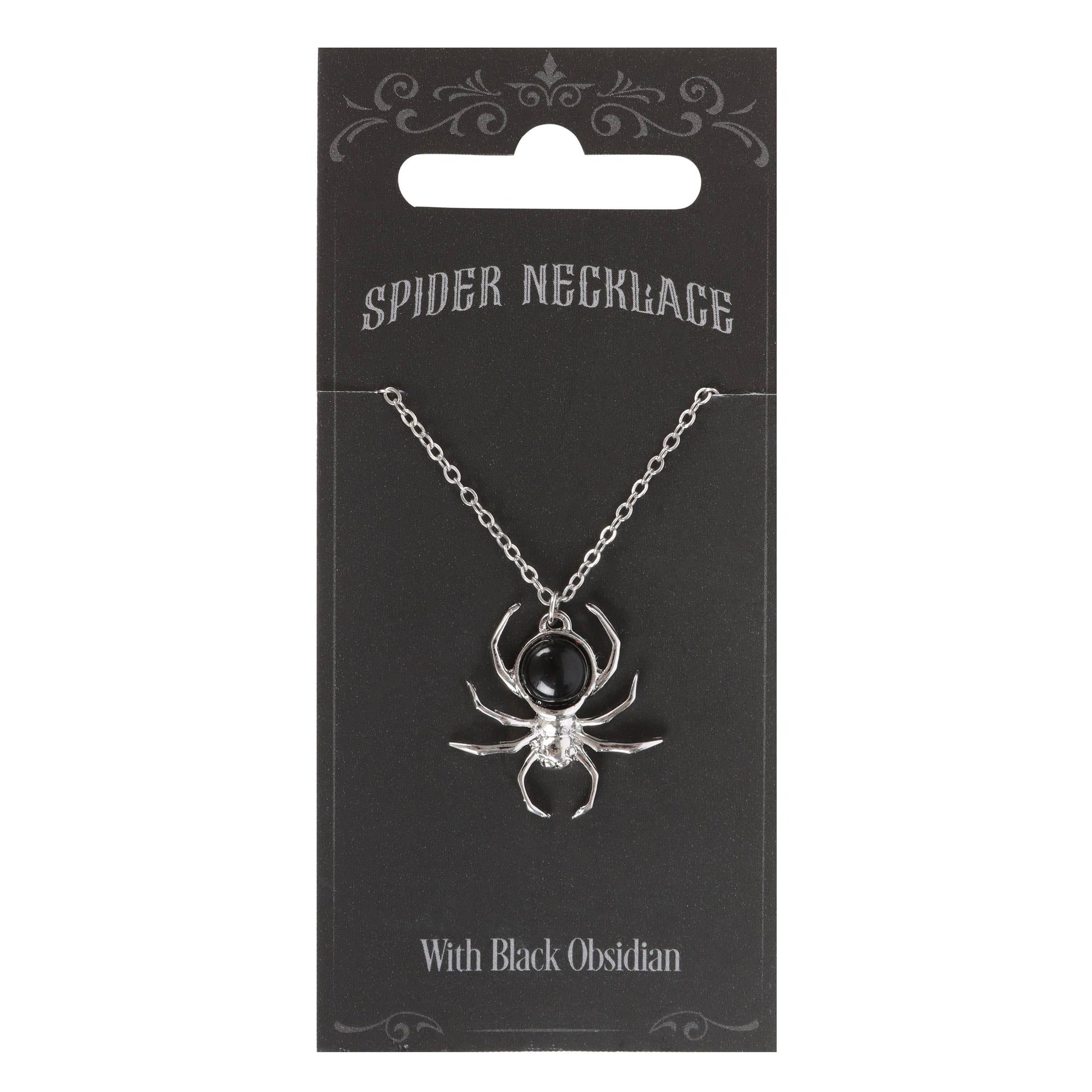 Spider necklace with black obsidian on a black card packaging